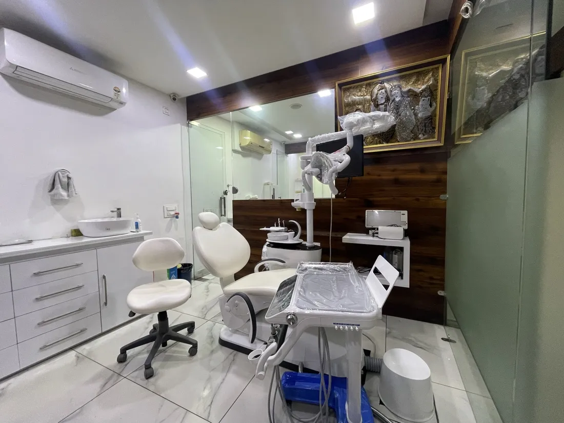A bright, marble-floored treatment room at Bansal Dental Care Clinic